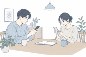 パートナーがそれぞれスマートフォンで受診の準備をする様子